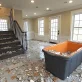 home renovation interior with staircase and debris for remodeling inspiration photo